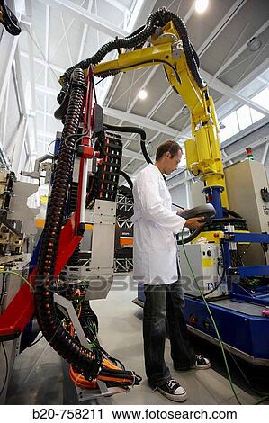 Researcher working on Roptalmu portable robot to drill holes into aircraft components, Fatronik-Tecnalia, Research and Technology Center, Donostia, Basque Country, Spain View Large Photo Image Stock Image - Researcher working on Roptalmu portable robot to drill holes into aircraft components, Fatronik-Tecnalia, Research and Technology Center, Donostia, Basque Country, Spain. Fotosearch