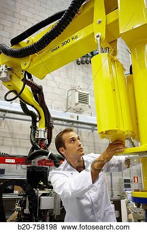 Researcher working on Roptalmu portable robot to drill holes into aircraft components, Fatronik-Tecnalia, Research and Technology Center, Donostia, Basque Country, Spain View Large Photo Image Stock Photo - Researcher working on Roptalmu portable robot to drill holes into aircraft components, Fatronik-Tecnalia, Research and Technology Center, Donostia, Basque Country, Spain. Fotosearch