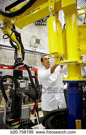Researcher working on Roptalmu portable robot to drill holes into aircraft components, Fatronik-Tecnalia, Research and Technology Center, Donostia, Basque Country, Spain View Large Photo Image Stock Photo - Researcher working on Roptalmu portable robot to drill holes into aircraft components, Fatronik-Tecnalia, Research and Technology Center, Donostia, Basque Country, Spain. Fotosearch