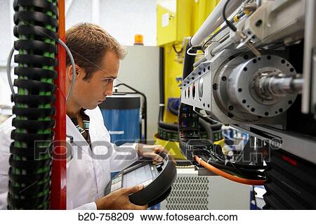 Researcher working on Roptalmu portable robot to drill holes into aircraft components, Fatronik-Tecnalia, Research and Technology Center, Donostia, Basque Country, Spain View Large Photo Image Stock Photo - Researcher working on Roptalmu portable robot to drill holes into aircraft components, Fatronik-Tecnalia, Research and Technology Center, Donostia, Basque Country, Spain. Fotosearch
