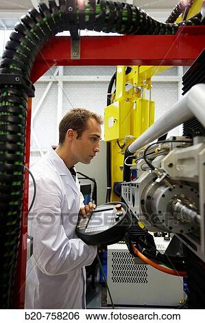 Researcher working on Roptalmu portable robot to drill holes into aircraft components, Fatronik-Tecnalia, Research and Technology Center, Donostia, Basque Country, Spain View Large Photo Image Stock Photograph - Researcher working on Roptalmu portable robot to drill holes into aircraft components, Fatronik-Tecnalia, Research and Technology Center, Donostia, Basque Country, Spain. Fotosearch