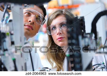 Researchers. Industrial Robot System. Tecnacomp Robotic cell manufacturing composite preforms Dry fiber preform manufacturing 3D Industry. View Large Photo Image Stock Image - Researchers. Industrial Robot System. Tecnacomp Robotic cell manufacturing composite preforms Dry fiber preform manufacturing 3D Industry.. Fotosearch