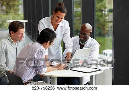 Stock Photograph - Researchers meeting, Fatronik-Tecnalia, Research and Technology Center, Donostia, Basque Country, Spain. Fotosearch