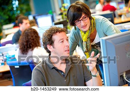 Stock Photo - Researchers, Natural Language Technologies, library, Vicomtech-IK4 Visual Interaction and Communication Technologies Centre, applied research centre for Interactive Computer Graphics and Multimedia. Fotosearch