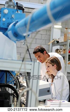Stock Image - Researchers. Prototype test bench for the development of electromechanical linear actuators for the aerospace industry. Technology and Research Center. Technological Park. San Sebastian. Donostia. Gipuzkoa. Basque Country. Spain.. Fotosearch