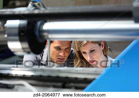 Researchers. Prototype test bench for the development of electromechanical linear actuators for the aerospace industry. View Large Photo Image Stock Photo - Researchers. Prototype test bench for the development of electromechanical linear actuators for the aerospace industry.. Fotosearch