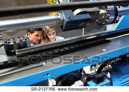 Stock Photograph - Researchers. Prototype test bench for the development of electromechanical linear actuators for the aerospace industry. Technology and Research Center. Technological Park. San Sebastian. Donostia. Gipuzkoa. Basque Country. Spain.. Fotosearch