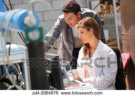 Researchers. Prototype test bench for the development of electromechanical linear actuators for the aerospace industry. View Large Photo Image Stock Photograph - Researchers. Prototype test bench for the development of electromechanical linear actuators for the aerospace industry.. Fotosearch