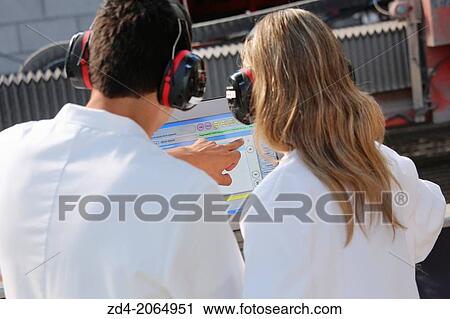Researchers with glasses and ear protection. View Large Photo Image Stock Image - Researchers with glasses and ear protection.. Fotosearch