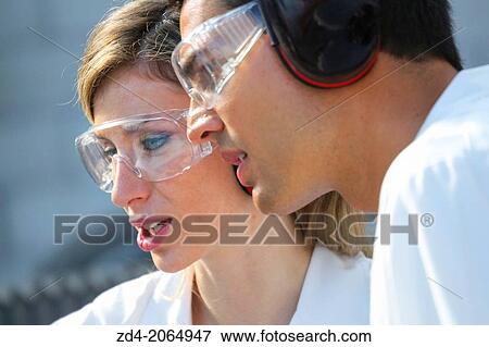 Researchers with glasses and ear protection. View Large Photo Image Stock Photo - Researchers with glasses and ear protection.. Fotosearch