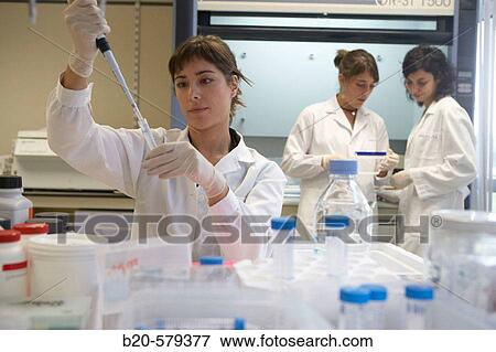 Stock Photo - Researchers working in laboratory. Fundaci? n Inbiomed, Genetrix Group. Center for research in stem cells and regenerative medicine. Donostia, San Sebastian, Euskadi. Spain.. Fotosearch