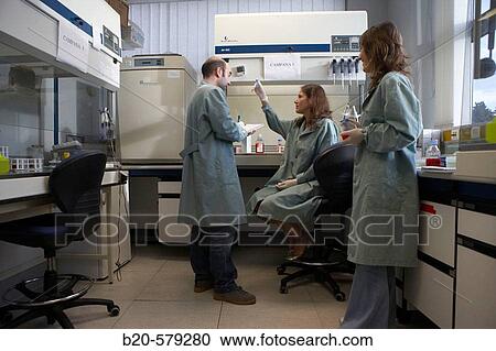 Researchers working on cell cultures. Laminar flow hood. Laboratory, Fundaci? n Inbiomed, Genetrix Group. Center for research in stem cells and regenerative medicine. Donostia, San Sebastian, Euskadi. Spain. View Large Photo Image Stock Image - Researchers working on cell cultures. Laminar flow hood. Laboratory, Fundaci? n Inbiomed, Genetrix Group. Center for research in stem cells and regenerative medicine. Donostia, San Sebastian, Euskadi. Spain.. Fotosearch