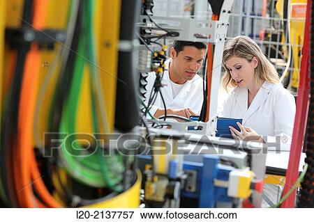 Researchers working on portable robot. Aerospace industry. Technology and Research Center. Miramon Technological Park. San Sebastian. Donostia. Gipuzkoa. Basque Country. Spain. View Large Photo Image Stock Photo - Researchers working on portable robot. Aerospace industry. Technology and Research Center. Miramon Technological Park. San Sebastian. Donostia. Gipuzkoa. Basque Country. Spain.. Fotosearch