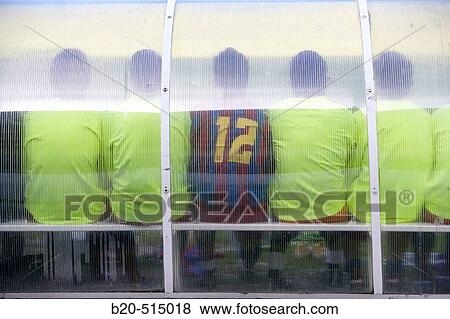 Stock Photo - Reserves in the bench. Football players.. Fotosearch