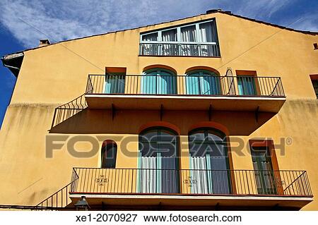 Residential building, balconies, Viladrau, Catalonia, Spain View Large Photo Image Stock Photo - Residential building, balconies, Viladrau, Catalonia, Spain. Fotosearch