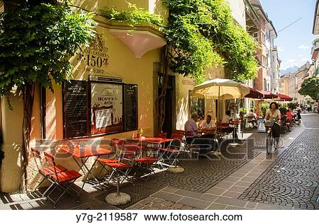 Restaurant, beer garden, building with facade greenery. Bolzano, South Tyrol, Italy, Europe. View Large Photo Image Stock Photo - Restaurant, beer garden, building with facade greenery. Bolzano, South Tyrol, Italy, Europe.. Fotosearch