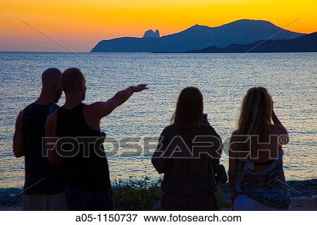 Restaurant Cap des Falco. Chiringuito. Es Codolar Beach. Ses Salines Natural Park. Young people enjoying the Sunset. Ibiza. Balearic Islands Spain. View Large Photo Image Stock Photo - Restaurant Cap des Falco. Chiringuito. Es Codolar Beach. Ses Salines Natural Park. Young people enjoying the Sunset. Ibiza. Balearic Islands Spain.. Fotosearch