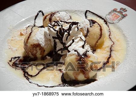 Restaurant of the Hotel St Florian, in Loket Apricot dumplings Loket, Bohemia, Czech Republic, Europe View Large Photo Image Stock Photography - Restaurant of the Hotel St Florian, in Loket Apricot dumplings Loket, Bohemia, Czech Republic, Europe. Fotosearch