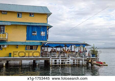 Restaurant over the sea in Bocas Town on Isla Colon, Bocas del Toro, Panama View Large Photo Image Stock Photography - Restaurant over the sea in Bocas Town on Isla Colon, Bocas del Toro, Panama. Fotosearch