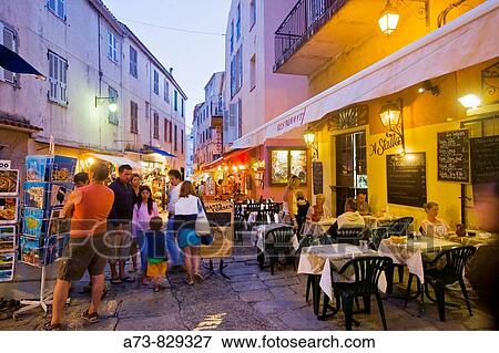 Restaurants and shops in Clemenceau street, Calvi. Haute-Corse, Corsica Island, France View Large Photo Image Stock Photo - Restaurants and shops in Clemenceau street, Calvi. Haute-Corse, Corsica Island, France. Fotosearch