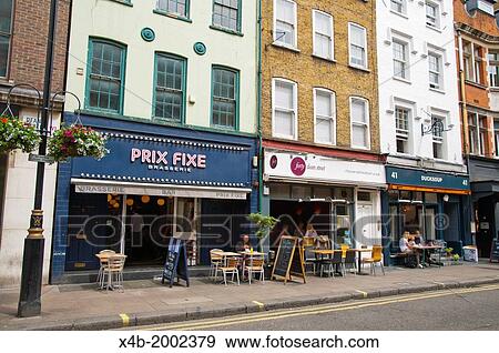 Restaurants Dean street Soho central London England Britain UK Europe. View Large Photo Image Stock Photo - Restaurants Dean street Soho central London England Britain UK Europe.. Fotosearch