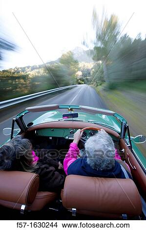Retired couple driving their Classic 1959 Porsche 356A Cabriolet View Large Photo Image Picture - Retired couple driving their Classic 1959 Porsche 356A Cabriolet. Fotosearch