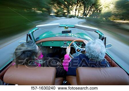 Retired couple driving their Classic 1959 Porsche 356A Cabriolet View Large Photo Image Stock Image - Retired couple driving their Classic 1959 Porsche 356A Cabriolet. Fotosearch