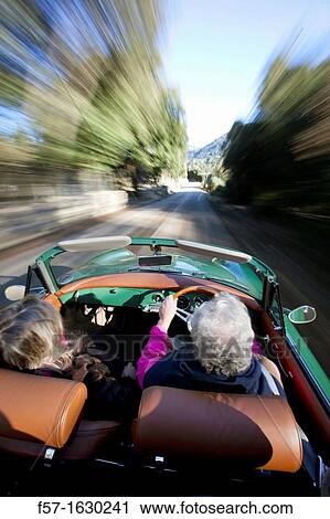 Retired couple driving their Classic 1959 Porsche 356A Cabriolet View Large Photo Image Stock Image - Retired couple driving their Classic 1959 Porsche 356A Cabriolet. Fotosearch