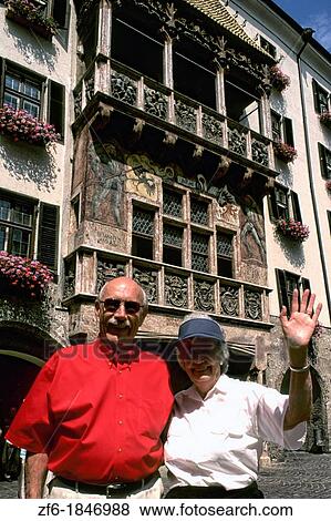 Retired couple tourists in Old Town of Innsbruck Austria. View Large Photo Image Stock Photo - Retired couple tourists in Old Town of Innsbruck Austria.. Fotosearch