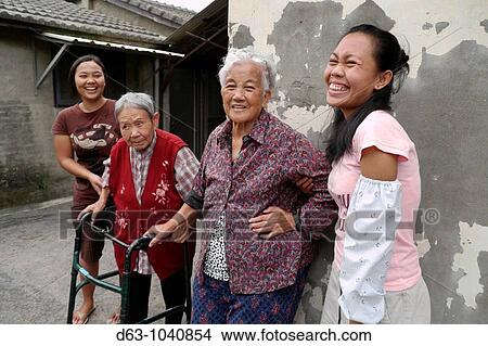 Picture - Retired KMT soldiers and their families at Chang Chyu village, Taichung, Taiwan. Fotosearch