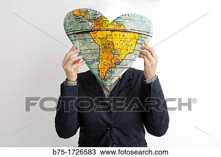Retrato de mujer con corazon tapando la cara, amor, Portrait of woman covering her face with heart, love View Large Photo Image Stock Image - Retrato de mujer con corazon tapando la cara, amor, Portrait of woman covering her face with heart, love. Fotosearch