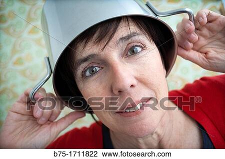 Retrato de mujer de pelo moreno y ojos verdes con una olla en la cabeza, Portrait of brown-haired woman with green eyes and a pot on his head, View Large Photo Image Stock Image - Retrato de mujer de pelo moreno y ojos verdes con una olla en la cabeza, Portrait of brown-haired woman with green eyes and a pot on his head,. Fotosearch