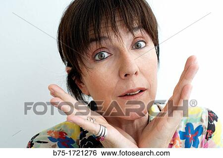 Retrato de mujer de pelo moreno y ojos verdes con expresion relajada, Portrait of brown-haired woman with green eyes and relaxed expression, View Large Photo Image Stock Photograph - Retrato de mujer de pelo moreno y ojos verdes con expresion relajada, Portrait of brown-haired woman with green eyes and relaxed expression,. Fotosearch