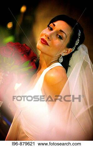 Stock Image - retro, dramatic, vintage, beautiful bride with bouquet. Fotosearch