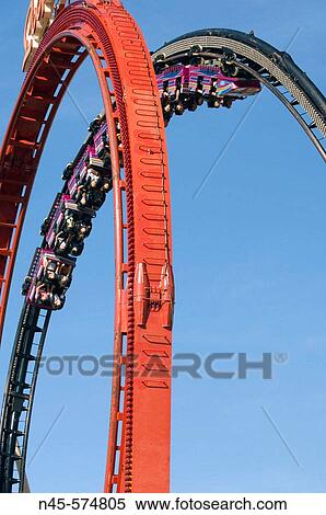 Stock Photography - Reverlers on a ride at the Fairground. Fotosearch