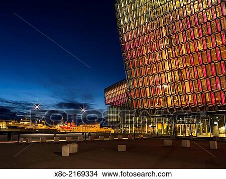 Reykjavik, Harpa, the new convert hall and conference center (inaugurated in 2011), night shot. The buidling is considered to be one of the new architectural icons of Iceland. europe, northern europe, iceland, February. View Large Photo Image Picture - Reykjavik, Harpa, the new convert hall and conference center (inaugurated in 2011), night shot. The buidling is considered to be one of the new architectural icons of Iceland. europe, northern europe, iceland, February.. Fotosearch