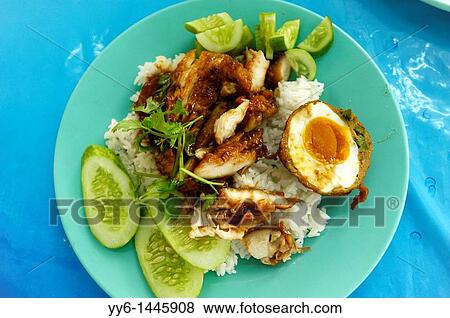 rice served with slice fried pork with son in law egg, food court, bangkok, thailand View Large Photo Image Stock Photo - rice served with slice fried pork with son in law egg, food court, bangkok, thailand. Fotosearch
