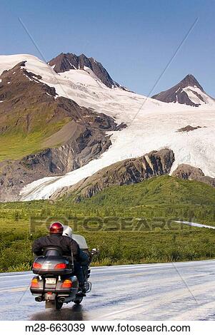Stock Photo - Richardson Highway winding its way up to Thompson Pass. In the background is the Worthington Glacier. Alaska, USA. Fotosearch