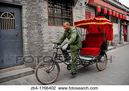Rickshaw in a street of a hutong, Beijing, China, Asia View Large Photo Image Stock Image - Rickshaw in a street of a hutong, Beijing, China, Asia. Fotosearch