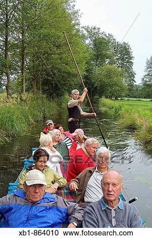 Stock Image - Ride with a typical Spreewald ship, Spreewald, district Oberspreewald-Lausitz, Brandenburg, Germany. Fotosearch