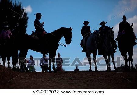 Riders wait to cross in the Guadiamar's river ford, known as Vado del Quema, during the pilgrimage to the shrine of the Virgin of Rocio, in Aznalcazar, Sevilla province, Andalusia, Spain View Large Photo Image Stock Image - Riders wait to cross in the Guadiamar's river ford, known as Vado del Quema, during the pilgrimage to the shrine of the Virgin of Rocio, in Aznalcazar, Sevilla province, Andalusia, Spain. Fotosearch