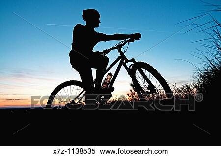 Stock Photography - Ridge to Rivers Mountain Bike Ranger mountain biking high in the Boise foothills near the city of Boise in southwestern Idaho. Fotosearch