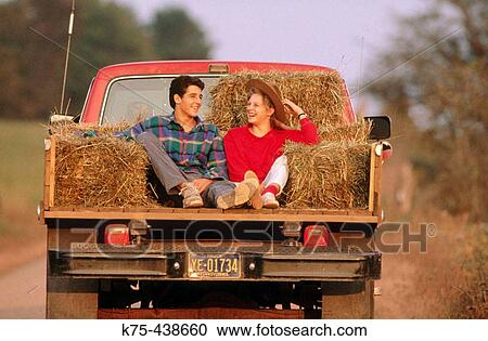 Riding in the back of a pick-up truck View Large Photo Image Stock Image - Riding in the back of a pick-up truck. Fotosearch