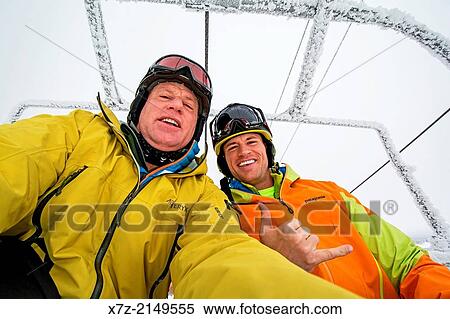 Stock Photography - Riding the Dreamcatcher chairlift while skiing at Grand Targhee Resort near the town of Alta in northern Wyoming.. Fotosearch