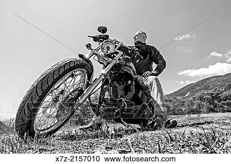 Riding the Harley Davidson Night Train hog motorcycle on Highway 33 high in the Sespe Mountains near the city of Ventura in southern California. View Large Photo Image Stock Image - Riding the Harley Davidson Night Train hog motorcycle on Highway 33 high in the Sespe Mountains near the city of Ventura in southern California.. Fotosearch