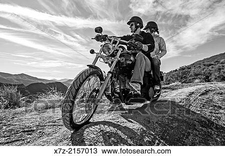 Riding the Harley Davidson Night Train hog motorcycle on Highway 33 high in the Sespe Mountains near the city of Ventura in southern California. View Large Photo Image Stock Image - Riding the Harley Davidson Night Train hog motorcycle on Highway 33 high in the Sespe Mountains near the city of Ventura in southern California.. Fotosearch
