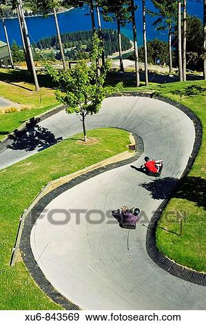 Riding the luge Queenstown, New Zealand View Large Photo Image Stock Photo - Riding the luge Queenstown, New Zealand. Fotosearch