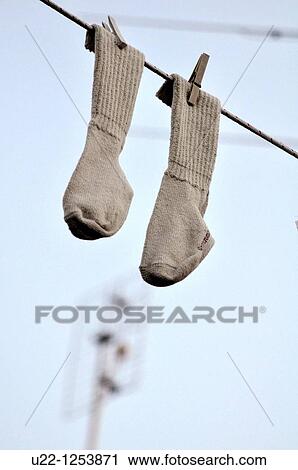 Rimini (Italy), socks hanging on a string, a decoration in San Giuliano neighborhood during the Festa de? Borg (Hood party) View Large Photo Image Stock Image - Rimini (Italy), socks hanging on a string, a decoration in San Giuliano neighborhood during the Festa de? Borg (Hood party). Fotosearch