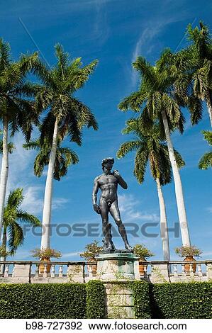 Stock Image - Ringling Museum of Art built John Ringling in Sarasota, Florida. Formal Italian Garden with copy of Michelangelo's David.. Fotosearch