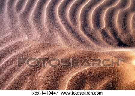 Ripple pattern in sand at Coral Pink Sand Dunes State Park in Utah, USA View Large Photo Image Stock Photo - Ripple pattern in sand at Coral Pink Sand Dunes State Park in Utah, USA. Fotosearch